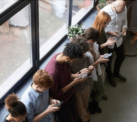 People holding mobile phones